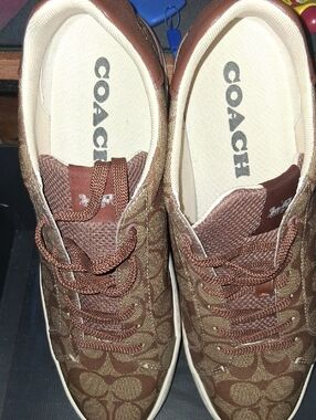 Coach Brown Signature Monogram Lace-Up Sneakers.